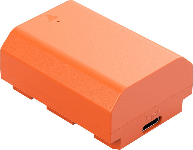 SmallRig 4969 USB-C ladattava kamera-akku NP-FZ100 on oranssi suorakulmainen laite, jossa on vino yläosa, pieni nuoli ja USB-C-syöttöportti sivulla.