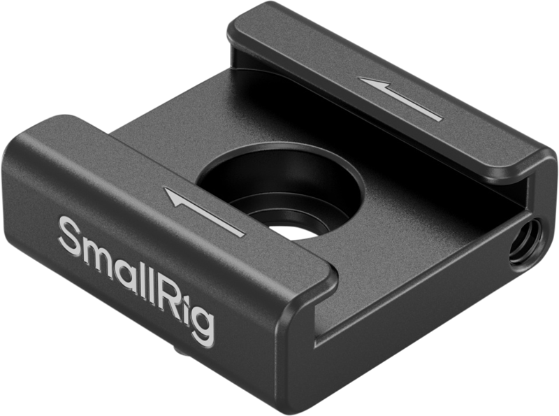 Black metal SmallRig 5032 Anti-Twist Cold Shoe Mount (2pcs) with two raised edges marked with white arrows and a central threaded hole for secure mounting of camera accessories.