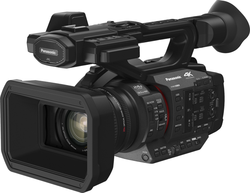 Panasonic HC-X2E -videokamera on 4K-ammattilaisvideokamera, jossa on suuri objektiivi, useita hallintalaitteita, yläkahva ja takatähtäin ja joka on suunniteltu teräväpiirtovideokuvaukseen.