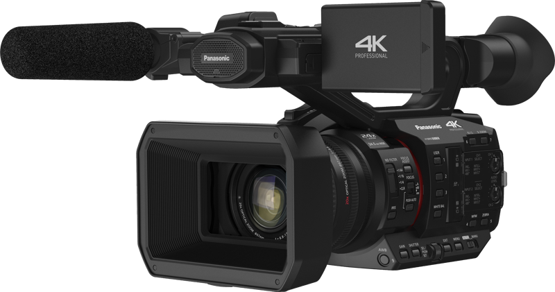 Panasonic HC-X20E on musta 4K-ammattilaisvideokamera, jossa on suuri mikrofoni, linssinsuojus ja useita sivusäätöpainikkeita ja -valitsimia.