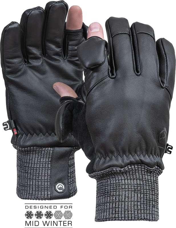 Vallerret Hatchet Leather Photography Glove mustalla (XS) -valokuvauskäsineessä on nahkainen ulkopinta, harmaat neulotut hihansuut, kosketusnäytölliset sormenpäät ja fleecevuori. Teksti alla: "Suunniteltu keskitalvea varten" lumihiutalekuvakkeilla.