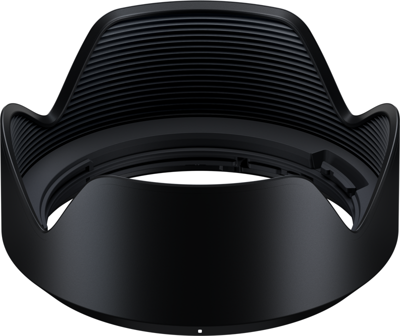 The Tamron Lens Hood for 28-300mm (A074S) is black with a petal-shaped, curved design and a brushed inner surface, shown from the front against a white background.