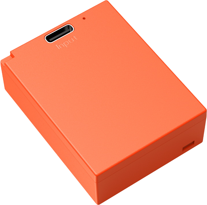 SmallRig 5088 USB-C ladattava kamera-akku NP-W126S Orange on suorakulmainen oranssi laite, jossa on USB-C-"tuloliitäntä" ja sen vieressä pieni merkkivalo yläpinnalla.
