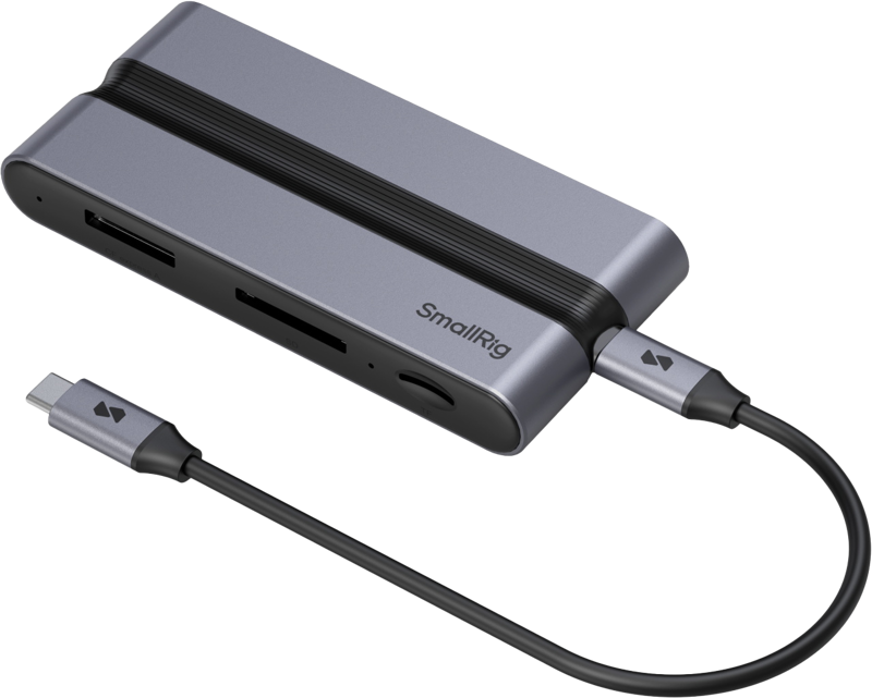 Tyylikäs, harmaa SmallRig 4663 CFexpress (Type A) Docking Station for Creators -muistikortinlukija, jossa on useita paikkoja ja liitetty USB-C-kaapeli, lepää vaalealla pinnalla.