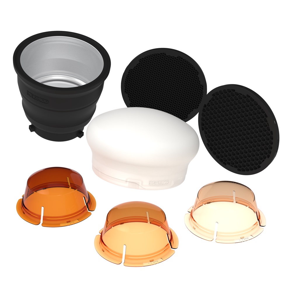 MagMod XL Professional Strobe Kit sisältää kokoontaitettavan mustan softboxin, kaksi mustaa hunajakennoverkkoa, valkoisen kupolidiffuusorin ja neljä oranssisävyistä värigeeliä eri sävyissä monipuoliseen valokuvausvalaistukseen.