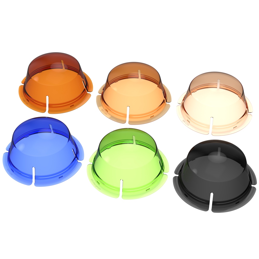 Kuusi MagMod XL Correction Dome -geeliä oranssin, vaalean oranssin, beigen, sinisen, vihreän ja mustan värisenä on sijoitettu kahteen kolmen hengen riviin valkoiselle taustalle. Jokaisessa läpikuultavassa kupolinmuotoisessa kannessa on neljä aukkoa pohjan ympärillä.