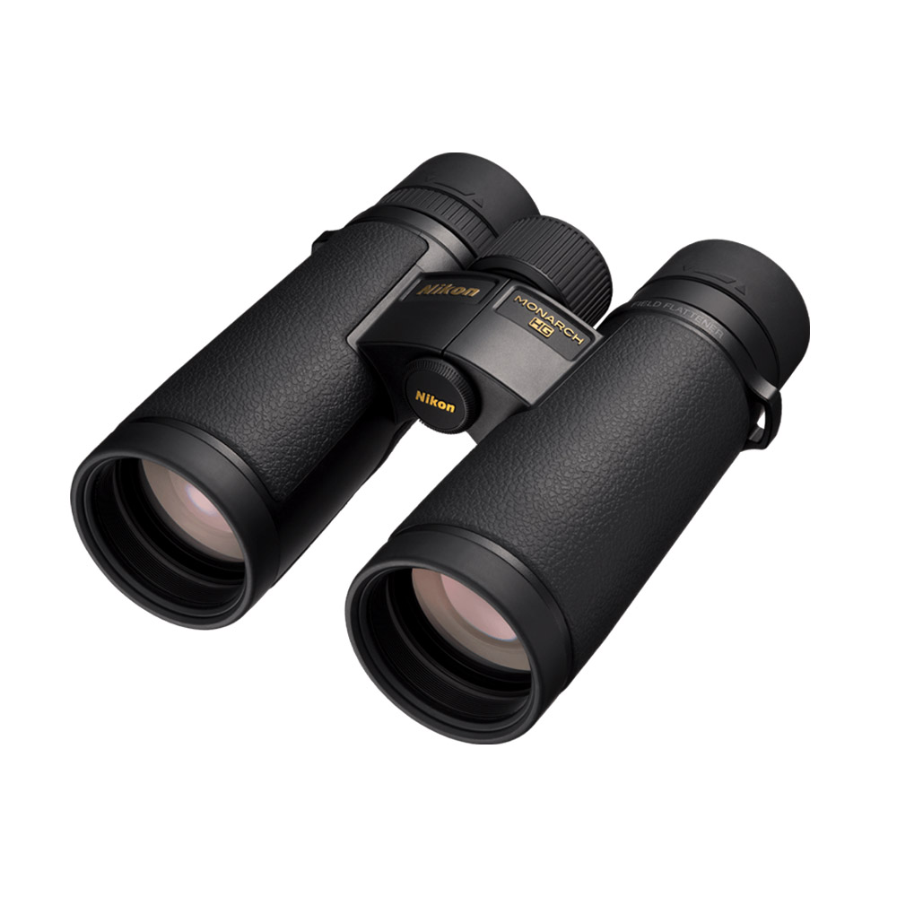 A pair of black Nikon Monarch HG 10x42 binoculars with textured handles, angled so that the eyepieces, lenses and focus wheel are visible against a white background.