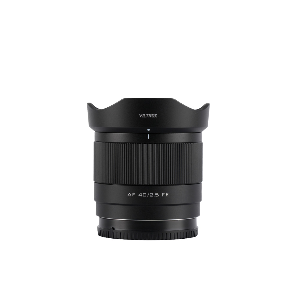 Viltrox AF 40mm f/2.5 lens, Sony E is shown upright on a white background with the lens hood attached and the make and model information on the front.
