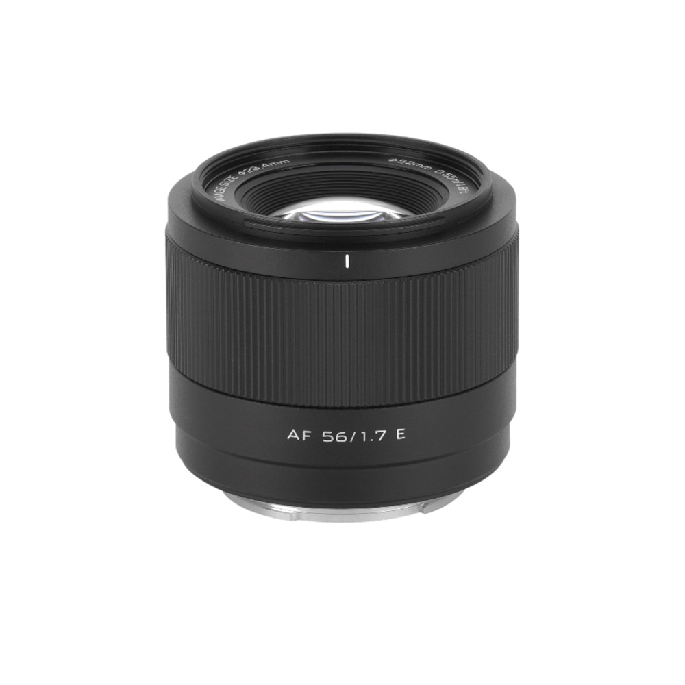 The black Viltrox AF 56mm F/1.7 Sony E camera lens stands upright against a white background, with a textured focus ring and visible clear glass elements.