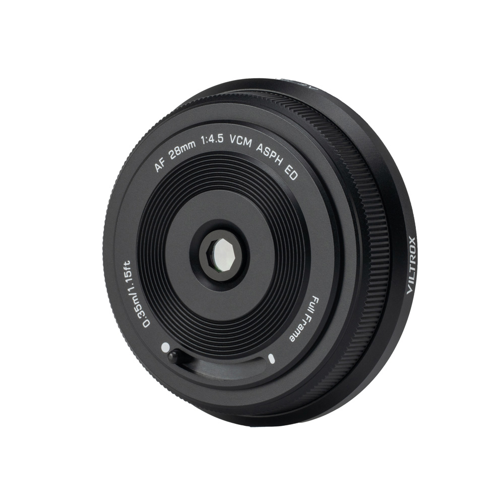 The Viltrox AF 28mm / 4.5 Nikon Z camera lens stands upright on a white background, with its front glass, focus ring and printed information visible.