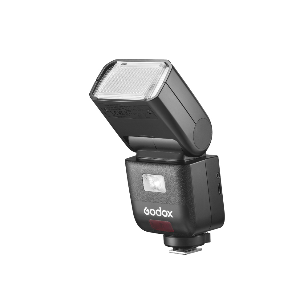 Godox V480 TTL Li-ion Head -salama on musta kamerasalama, jossa on kulmikas suorakulmainen pää, valkoinen diffuusoripaneeli ja punainen aksentti ja joka on suunniteltu asennettavaksi Fujifilm-kameroiden kuumakenkiin.