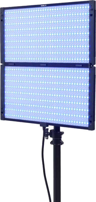 The Nanlite PavoSlim 240C RGBWW LED panel is a rectangular LED light on a stand that emits a bright blue light. It has a power cord on the back, and has two connected sections with rows of small LED bulbs on the surface.