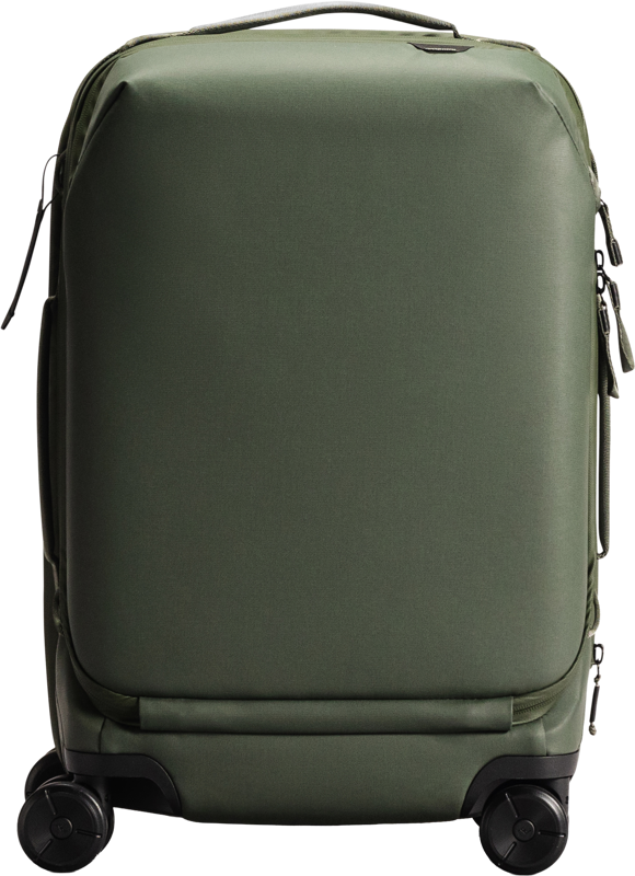 Peak Design Roller Pro Carry-On, vihreä, on vihreä kovakuorinen matkalaukku, jossa on neljä mustaa pyörää, yläkahva ja vetoketjusuljenta.