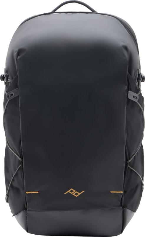 The Peak Design Outdoor Backpack Zip 18L Black is a sleek, minimalist backpack with a small gold logo near the middle of the bottom and two side pockets with strap fasteners.