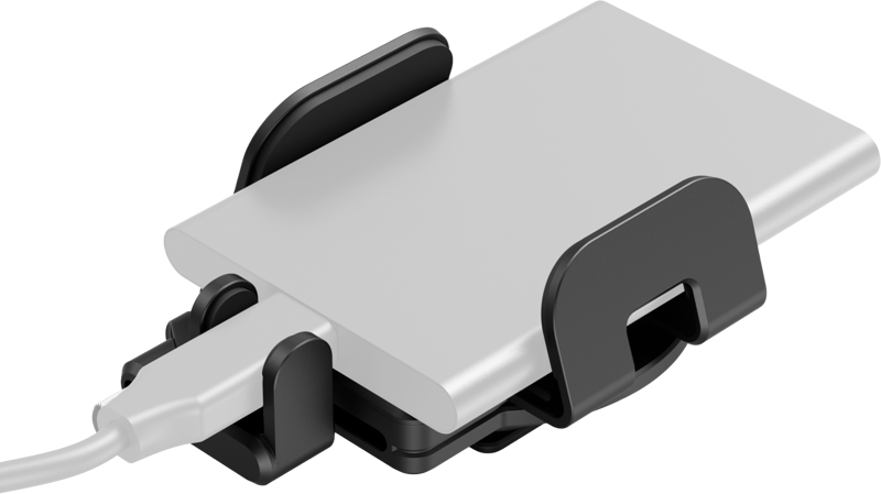 SmallRig 5196 Universal Mounting Clamp for External SSD -kiinnike pitää hopeanvärisen ulkoisen kiintolevyn tukevasti paikallaan ja yhdistää sen kaapeliin mustalla muovikiinnikkeellään.