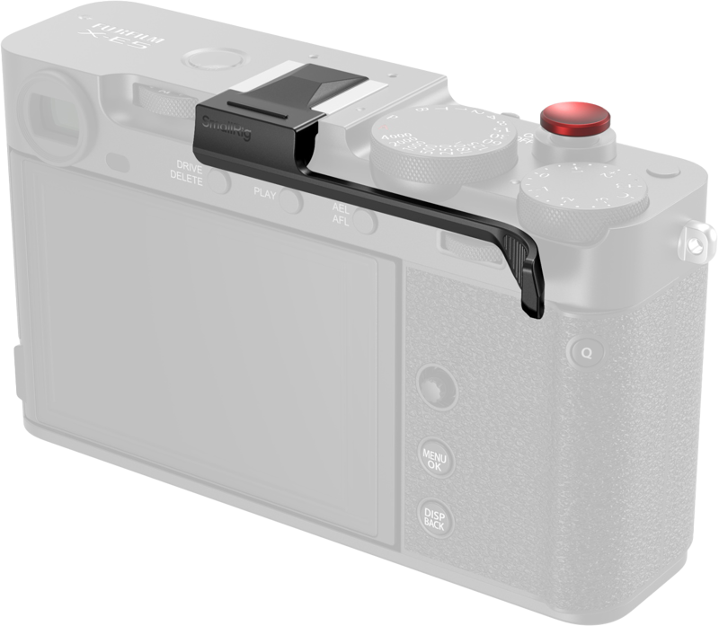 The SmallRig 5452 Thumb Grip for FUJIFILM X-E5 Black is attached to the hot shoe mount of your silver digital camera, above the screen and controls.