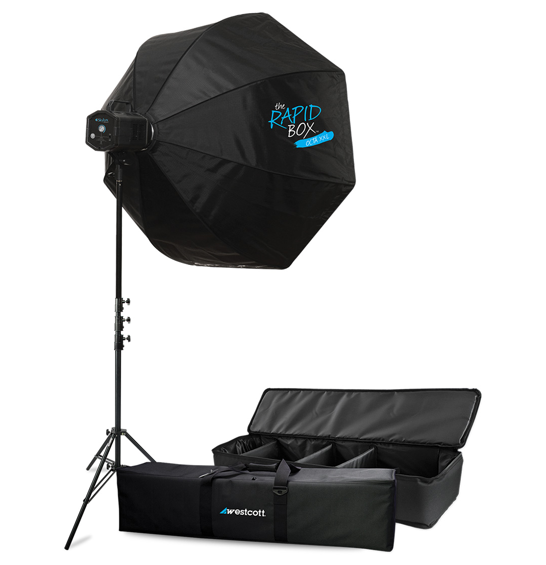 Westcott Skylux LED with 48" Rapid Box XXL Kit sisältää suuren kahdeksankulmaisen softboxin jalustalla, jonka edessä on säilytyslaukku ja kantolaukku. Softboxissa on merkintä "Rapid Box" ja "Westcott.