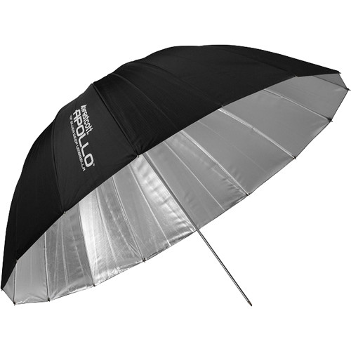 Westcott Deep Umbrella - Silver Bounce (109 cm) on suuri musta valokuvaussateenvarjo, jossa on heijastava hopeinen sisäpuoli ja jossa on valkoisella painettu "Westcott Apollo" yhdessä ulko-osassa.