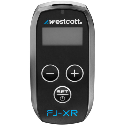 Langaton Westcott FJ-XR -vastaanotin, jossa on pieni näyttö, plus/miinus-painikkeet, SET-painike ja Westcottin tuotemerkki edessä.