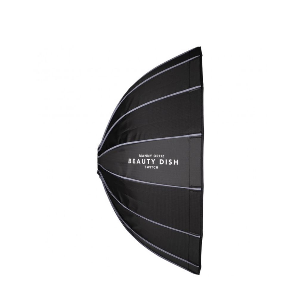 The Westcott Beauty Dish Switch by Manny Ortiz (91 cm, Silver Interior) is fitted with silver rods and has "Manny Ortiz Beauty Dish Switch" printed on the black side, displayed against a white background.
