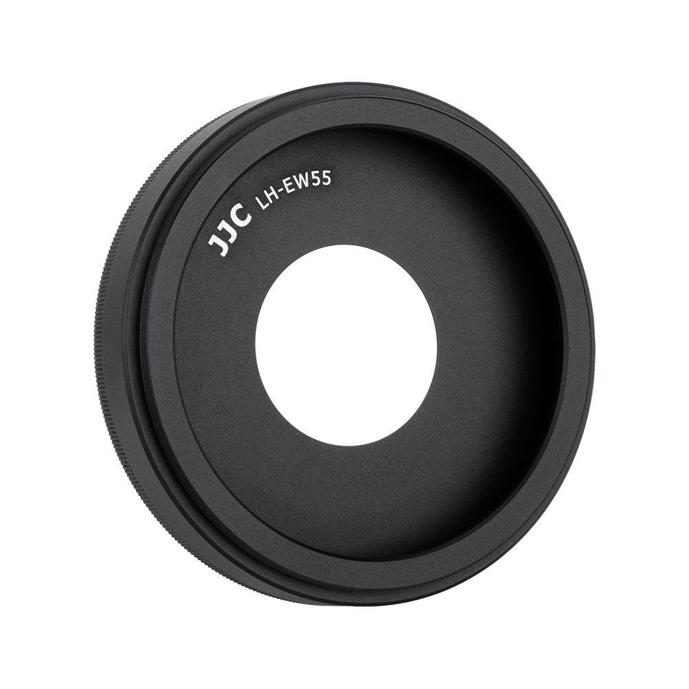 Musta, pyöreä JJC EW 55 Canon -vastavalosuoja, jossa on suuri keskiaukko, näkyy valkoista taustaa vasten.