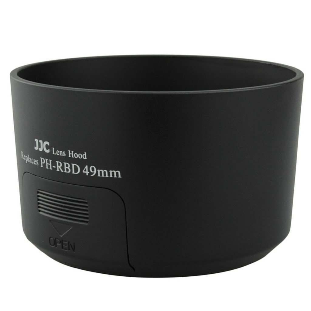 The black JJC PH RBD Pentax 49mm lens hood has "Replaces PH-RBD 49mm" and an OPEN indicator on the side with a down arrow.