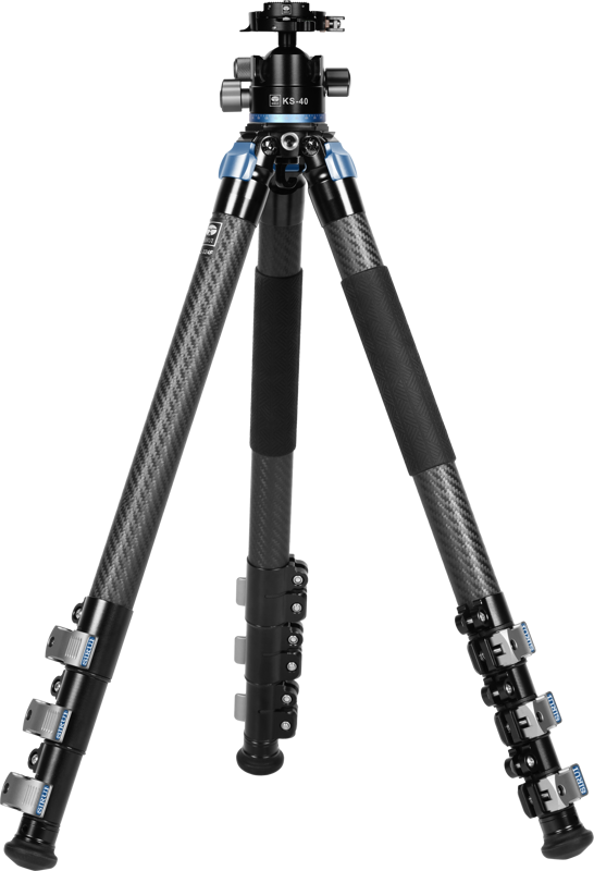 Sirui L-324F + KS-40 Carbon Fiber Tripod and Ball Head is a black carbon fiber tripod with three extended legs, blue accents near the head, padded handles on two legs and adjustable reversible locks on each segment.