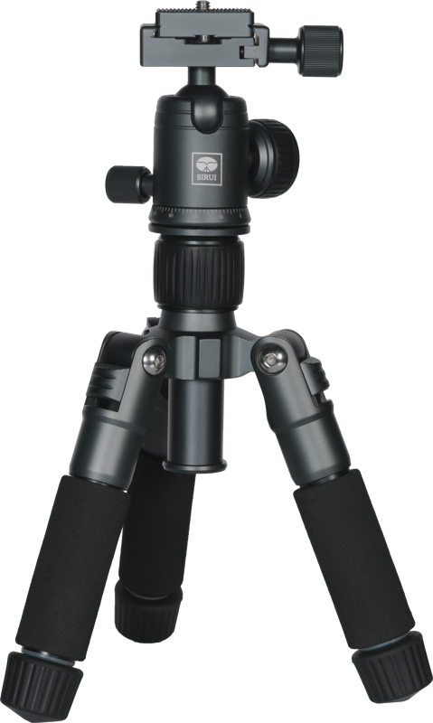 The Sirui TT-50 table stand is a compact black tripod with adjustable legs, ball head attachment, foam handles on each leg and multiple adjustment knobs for precise positioning.