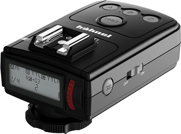 Hähnel Viper TTL Transmitter Fuji -lähetin on musta kameran salamalaukaisin, jossa on ohjauspainikkeet, nestekidenäyttö asetuksia varten, kiinnike ja sivussa oleva on/off-kytkin.