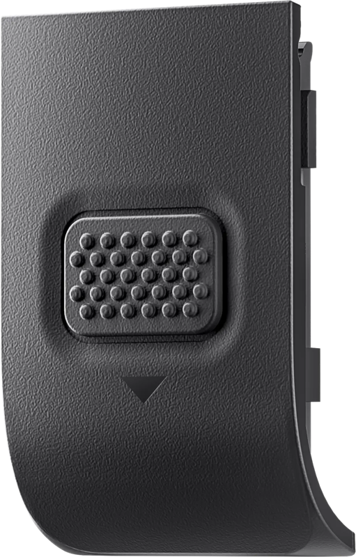 Lähikuvassa Insta360 Ace Pro USB Cover -liittimen suojasta näkyy sen musta kuvioitu muoviklipsi, jossa on suorakulmainen tyyny, jossa on koholla olevia kuoppia ja sen alla pieni alaspäin osoittava nuoli.