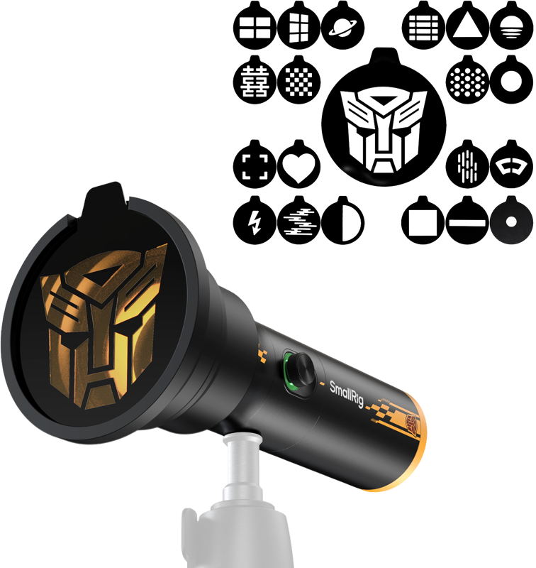 SmallRig 5512 RF-10C Portable Focusable LED Video Light - BumbleBee Edition - reflects the gold Transformers logo. Above it are 18 black gobos with different patterns.