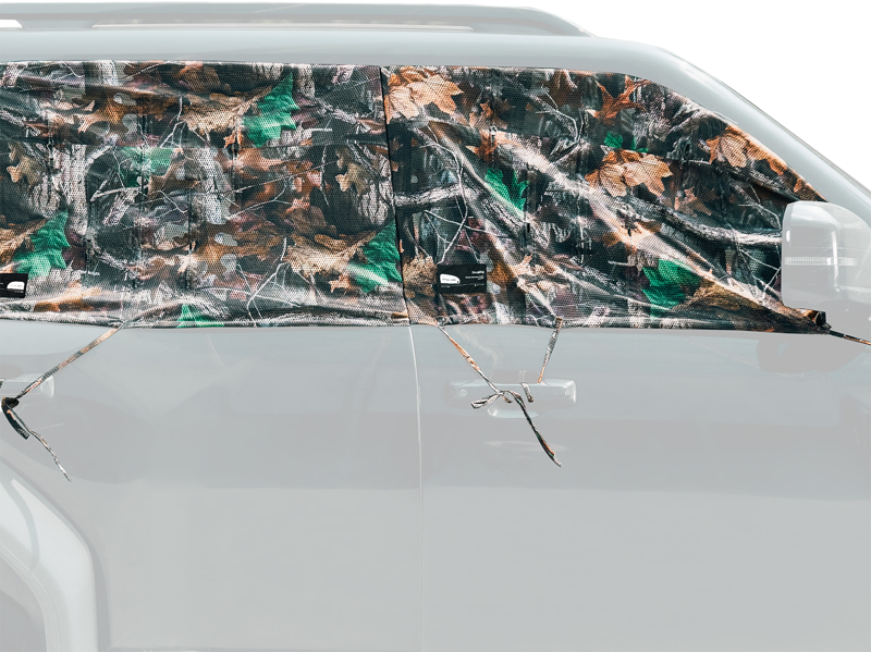 SmallRig 5498 The right-hand vehicle photography curtain (front & rear) is attached to the windows of a white vehicle with straps and clips, and partially covers the interior with a camouflage patterned deck.