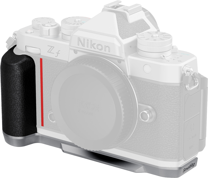 SmallRig 5706 L-muotoinen kiinnityslevy silikonikahvalla on kiinnitetty valkoiseen Nikon Z f -kameraan. Ainoastaan kahva ja pohjalevyn lisävaruste ovat selvästi näkyvissä, ja muu osa kamerasta näyttää haalistuneelta.