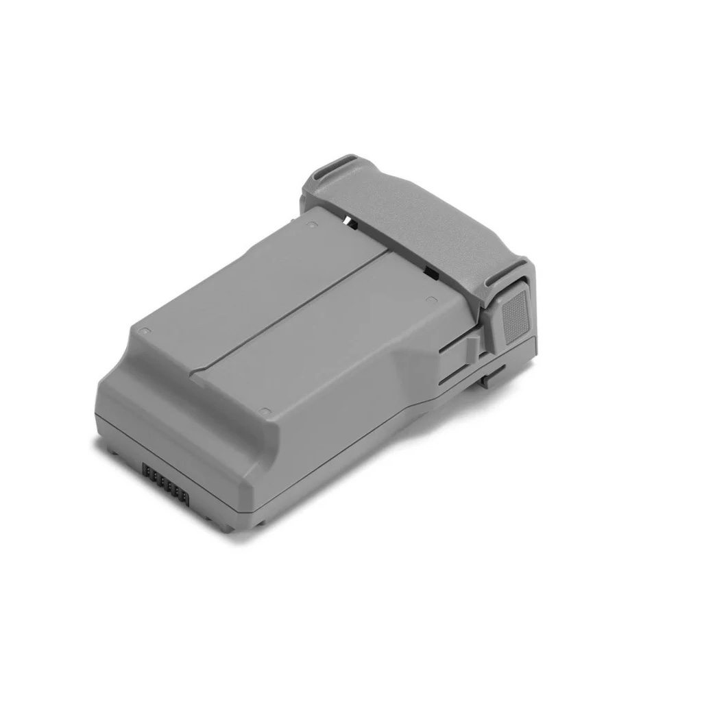 DJI Mini 5 Pro Intelligent Flight Battery -akku, harmaa ja suorakulmainen, jossa on salpa ja liitinliittimet, kuvassa valkoisella pohjalla.