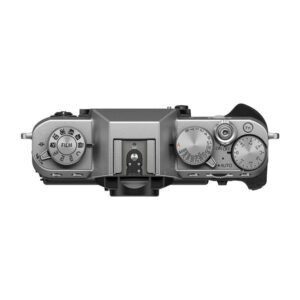 The top view of the Fujifilm X-T30 III Body Silver shows silver dials for film simulation, shutter speed, exposure compensation and other controls, a hot shoe mount in the centre and a textured grip on the right.
