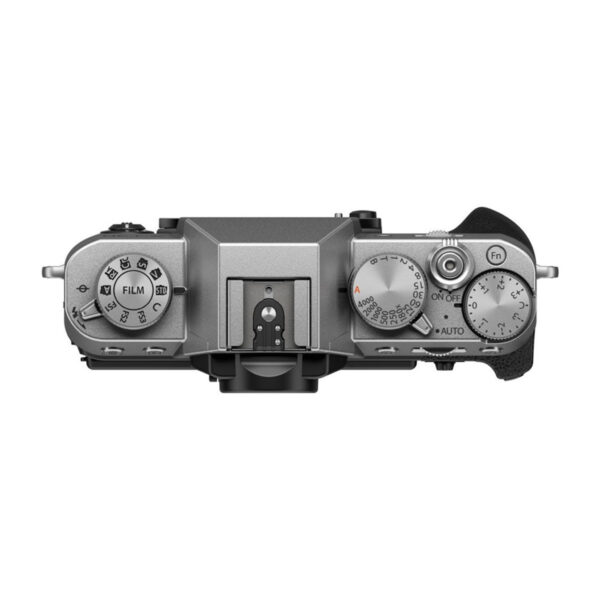 The top view of the Fujifilm X-T30 III Body Silver shows silver dials for film simulation, shutter speed, exposure compensation and other controls, a hot shoe mount in the centre and a textured grip on the right.