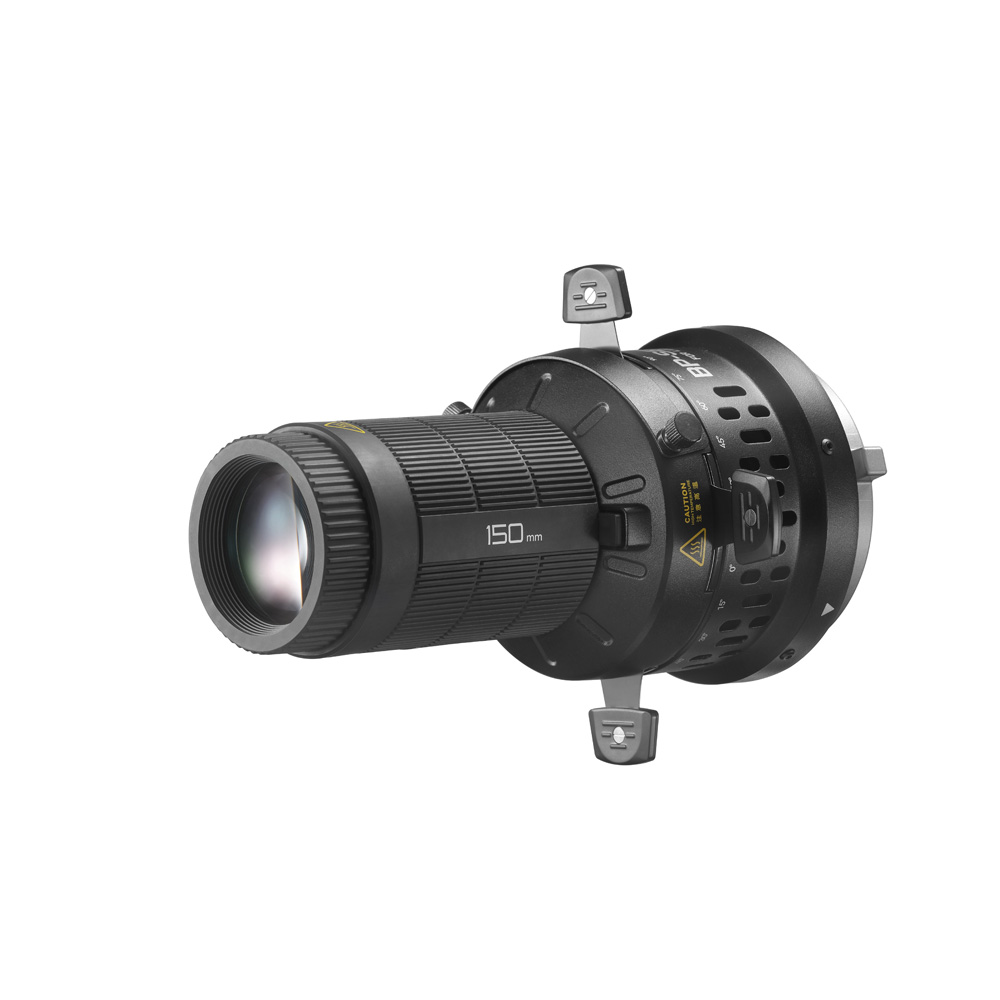Godox Litemons LED Projection Attachment 150mm, musta, jossa on kyljessä merkintä "150mm", on kuvassa kiinnitettynä pyöreään kiinnityssovittimeen, jossa on kolme säädettävää metallikiinnikettä, valkoista taustaa vasten kuvattuna.