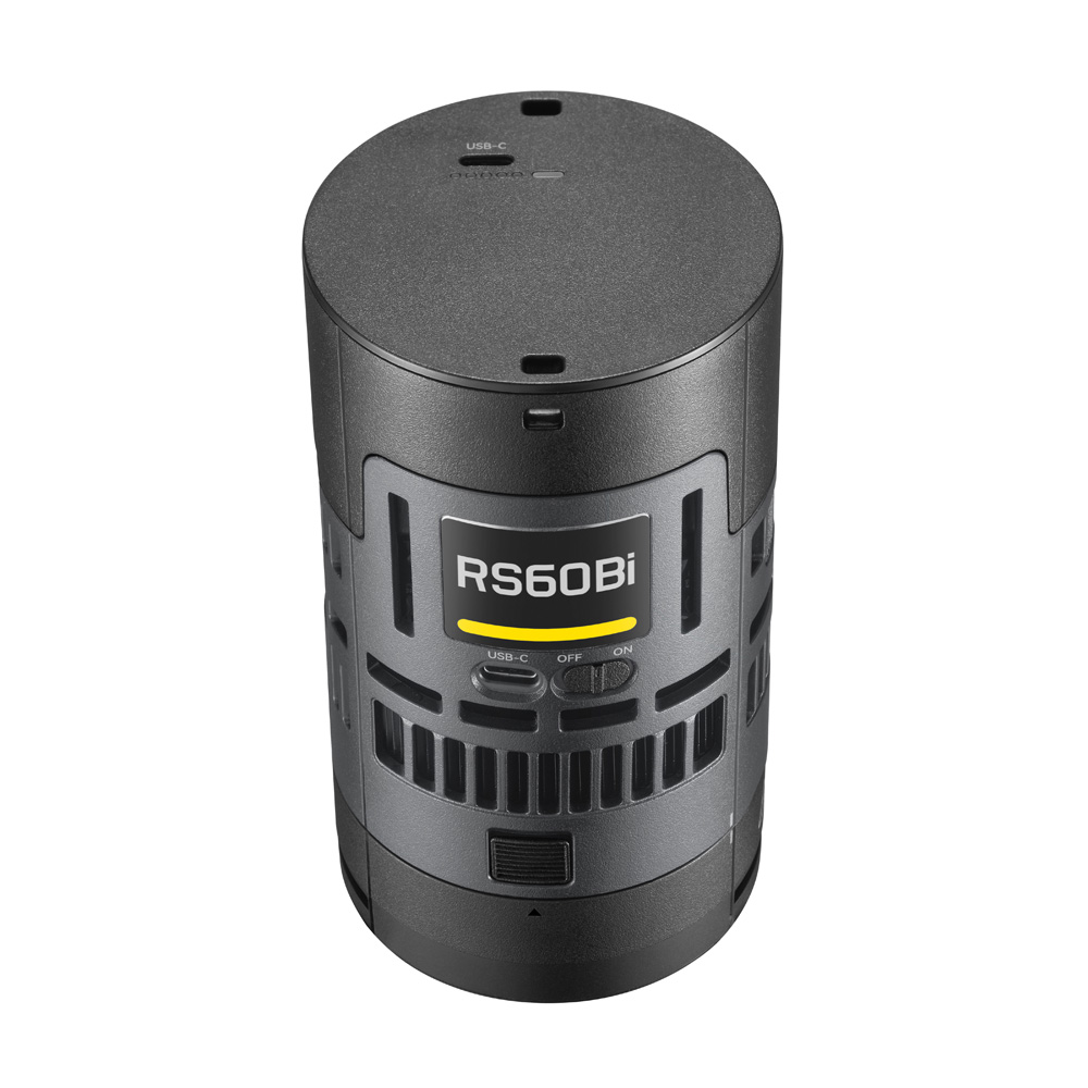 The top shows the cylindrical black Godox Litemons RS60BI Bi-Color LED luminaire with ventilation slots, buttons and a display marked RS60Bi. A USB-C port is visible on the top surface.