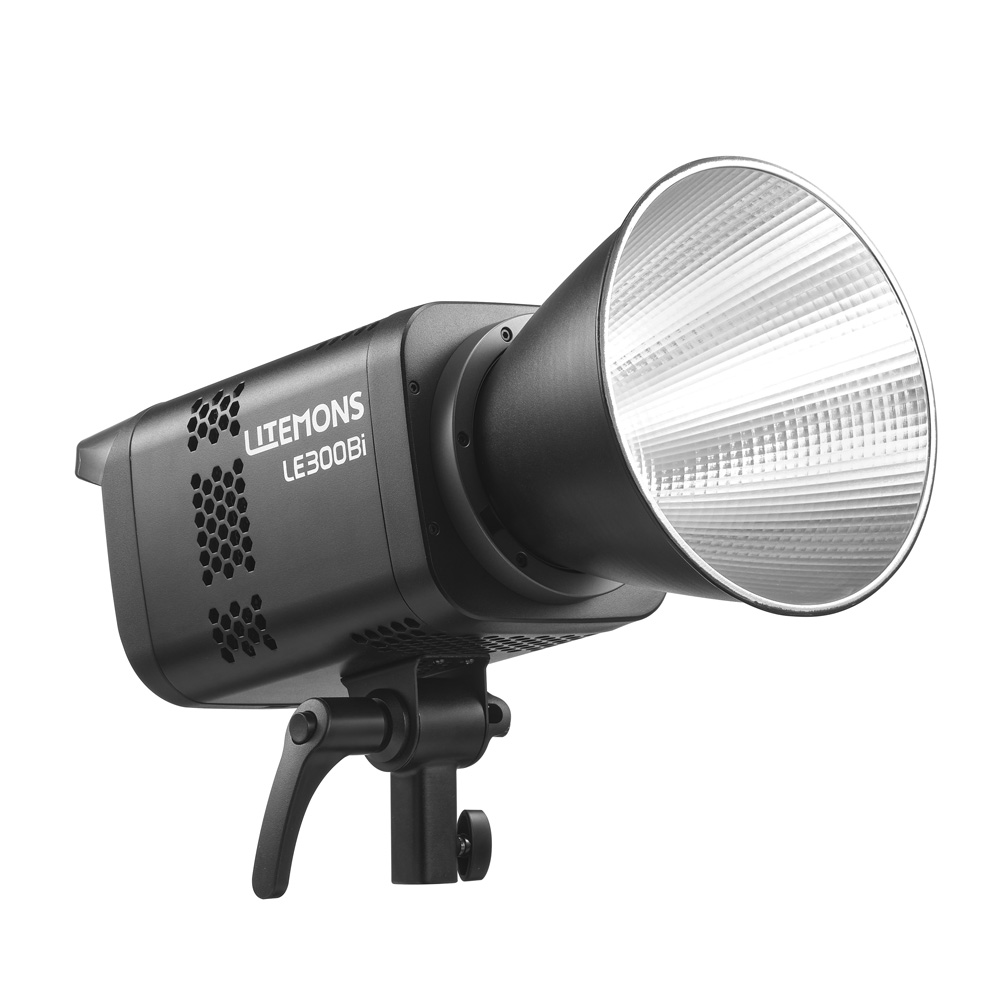 The Godox LE300Bi Black Litemons Bi-Color LED studio lamp with large silver reflector, mounted on an adjustable stand, is placed against a white background.